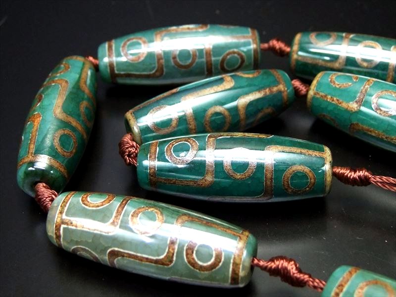 楽天市場】○龍の鱗模様【九眼緑龍紋天珠(くがんりゅうもんてんじゅ