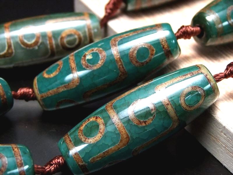 楽天市場】○龍の鱗模様【九眼緑龍紋天珠(くがんりゅうもんてんじゅ