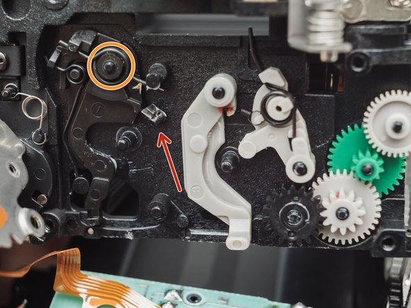 Pentax ZX-5n Mirror Drive Lever Replacement - iFixit Repair Guide